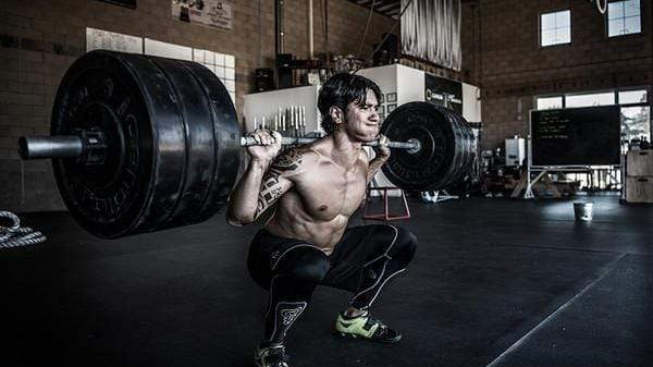 Put the Weight of the World on Your Shoulders to Improve in Crossfit
