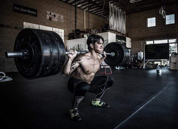 Put the Weight of the World on Your Shoulders to Improve in Crossfit