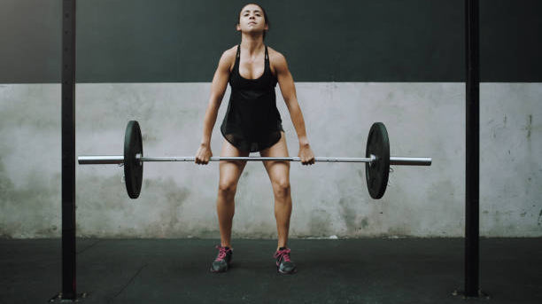 female trainer doing clean