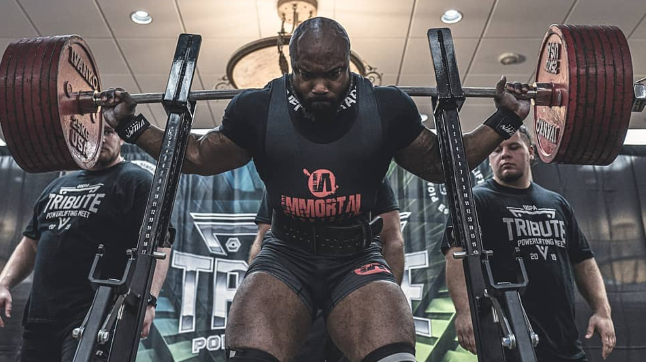 trainee wearing belt for squats