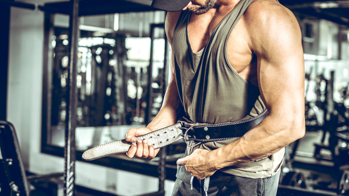 trainer wearing lifting belt