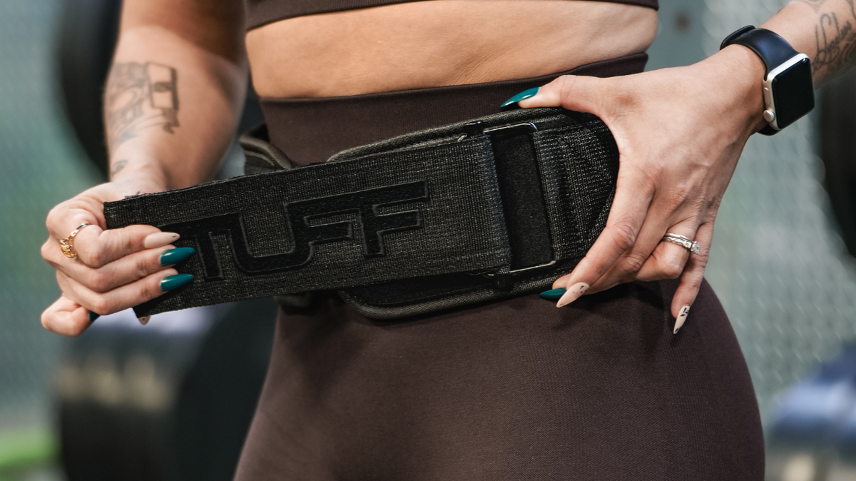 man wearing lifting belt that pinches him