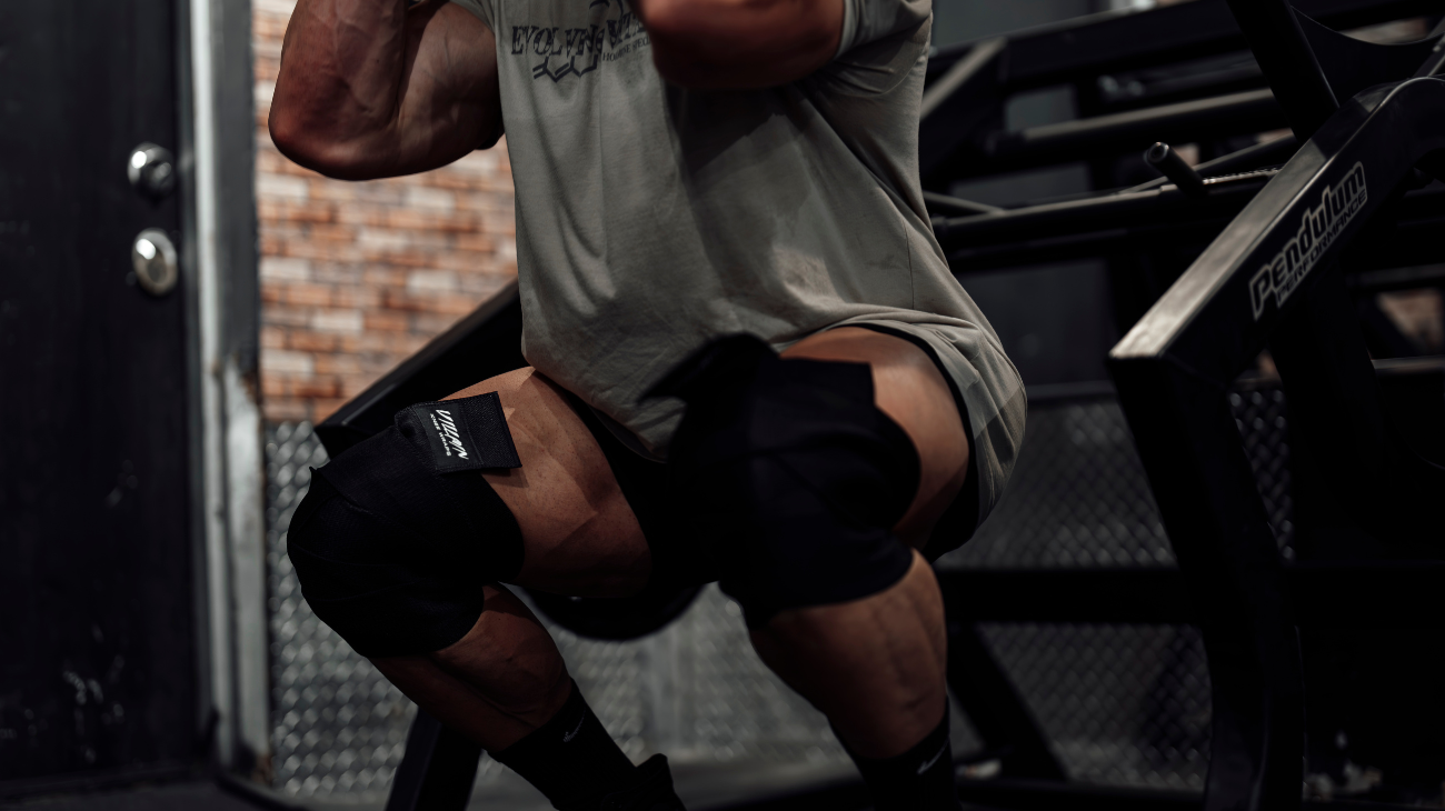 man with tight knee sleeves