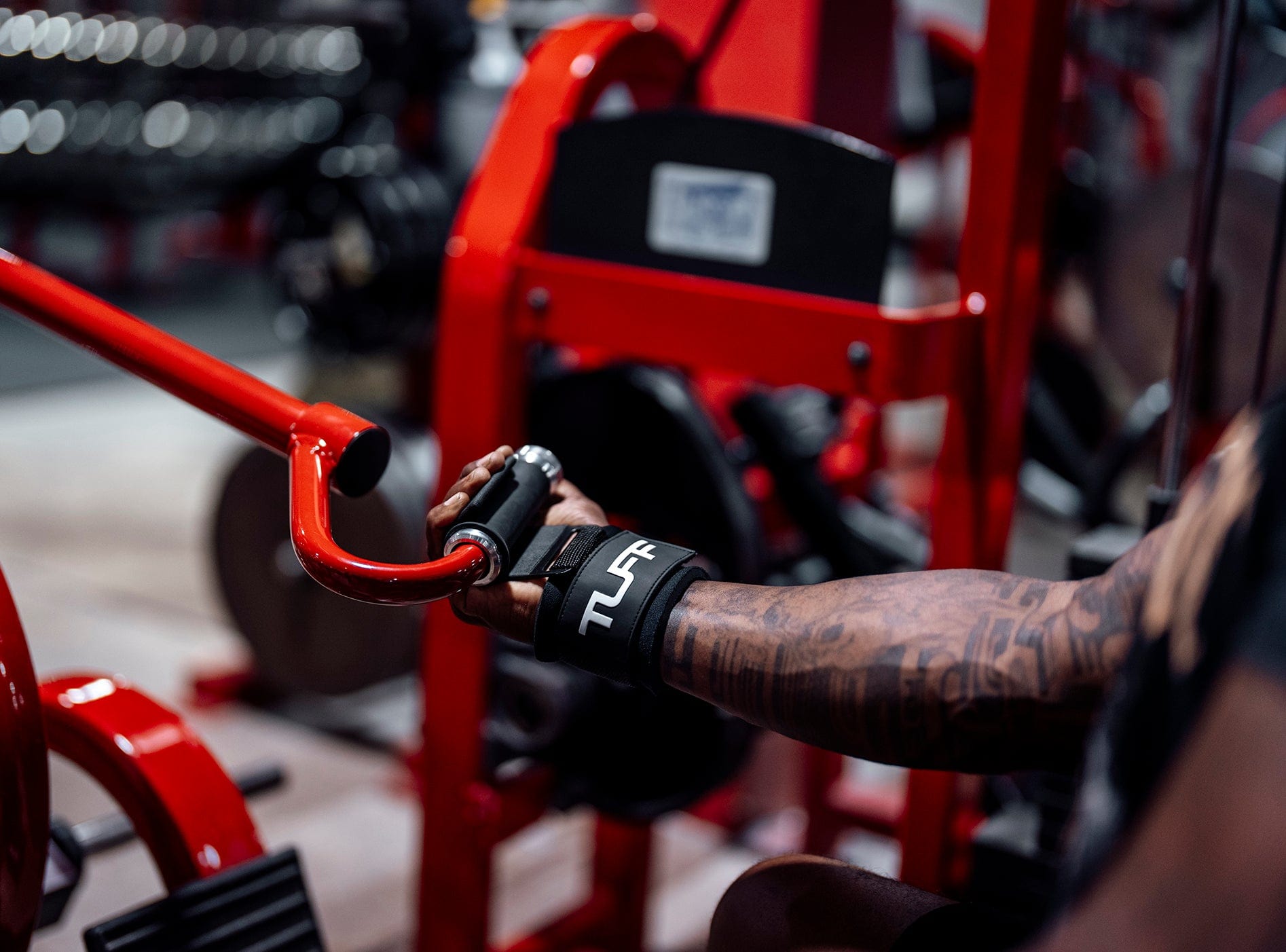 Lifting hooks grip showing one arm rows